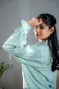 female green cuff detailing 3.webp